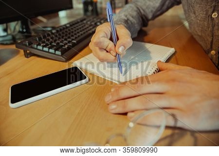 Close Up. Man Working From Home During Coronavirus Or Covid-19 Quarantine, Remote Office Concept. Yo
