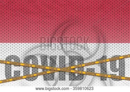 Indonesia Flag And Covid-19 Inscription With Orange Quarantine Border Tape. Coronavirus Or 2019-ncov