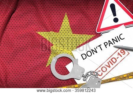 Vietnam Flag And Police Handcuffs With Inscription Dont Panic On White Paper. Coronavirus Or 2019-nc