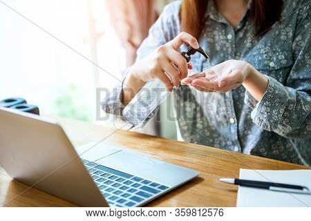 Bussiness Worman Work From Home Wearing Protection Mark In Covid-19 Virus Situation. Her Working In 