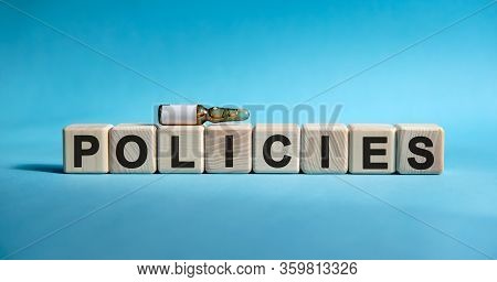 Policies - Text On Cubes. Drug In Ambula To Reduce Disease Symptoms On A Blue Background