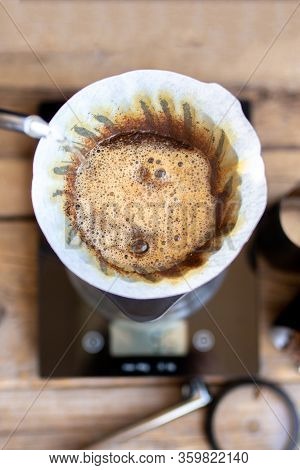 Ground Coffee In The Funnel.the Ritual Of Making Coffee.making Coffee At Home.filtered Or Overflow I
