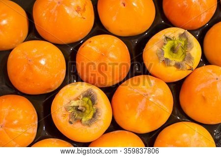 The Persimmon Is A Tropical Fruit Typical Of Autumn - Diospyros Kaki