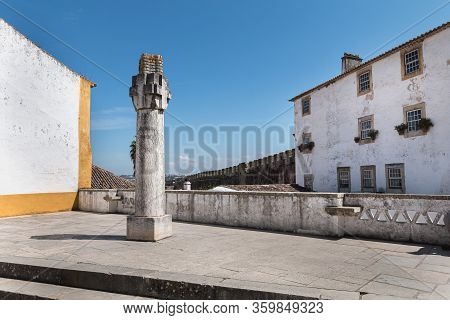 Obidos, Portugal - April 12, 2019: Carved Column In The Medieval Castle Of Obidos In The Leiria Dist