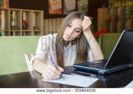 The Girl In The Cafe Makes An Entry In The Diary.