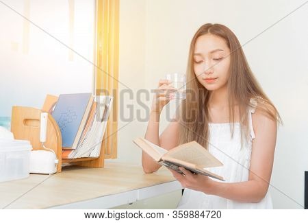 Wfh: Caucasian Asian Woman Stay Home Stay Safe. Social Distancing And Physical Distancing. Lifestyle