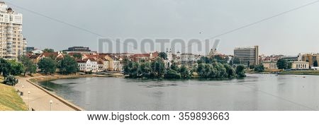 View at island of Tears memorial at Trinity Suburb in Minsk, Belarus. Minsk cityscape panorama in summer, Belarus.