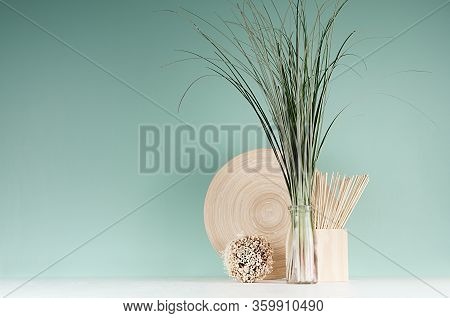 Minimalist Cozy Interior With Beige Natural Organic Home Decor - Bamboo Plate, Bouquet Of Herb In Bo