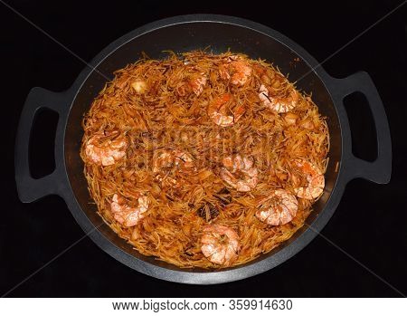 Preparing Some Noodles (fideua), Typical Spanish Dish