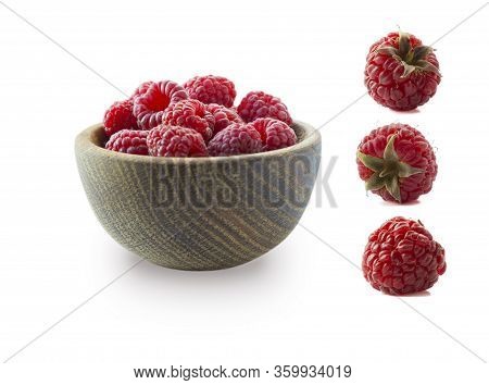 Raspberries Isolated On White Background. Raspberries On Wooden Bowl. Raspberry With Copy Space For 