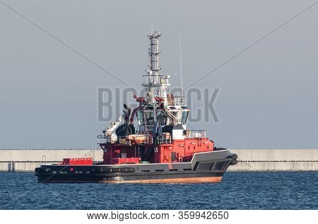 Fireboat - Multifunctional Firefighting Ship Maneuvers In Port