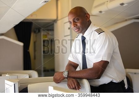 British Airways Middle Aged Africam Male Captain Pilot