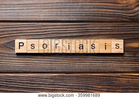 Psoriasis Word Written On Wood Block. Psoriasis Text On Table, Concept