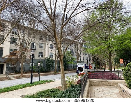 Atlanta, Ga/usa-3/21/20:  A Fedex Truck Delivering Package To Condominiums And Corporate Buildings I