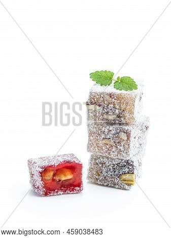 Turkish  Delight With Phistachio And Almond Covered With Coconut Isolated On White