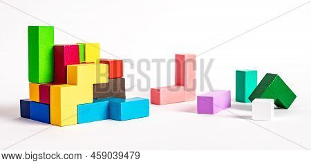 Colorful Wooden Elements Of Tetris Puzzle. Construction, Formation Concept. Kids Logical Game For Pr