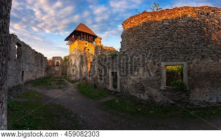 Panorama Of The Nevytske Castle. Ruins Of Ancient Fortress In Evening Light. Popular Travel Destinat