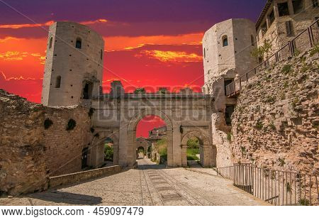 View Of Porta Venere During Sunset, City Gate Of Roman Arch In Spello, Umbria Italy