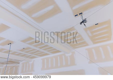 Plastering Drywall New Home On Walls Plasterboards Under Construction With Finishing Putty In The Ro