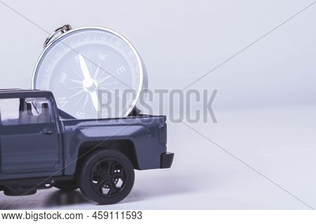 Tourist Travel By Car. Travel By Car. Compass And Car. Autotourism. Traveling Across Countries By La