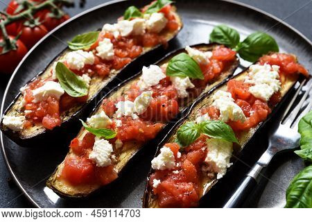 Eggplant Appetizer.
Baked Eggplant With Tomatoes, Ricotta And Basil.