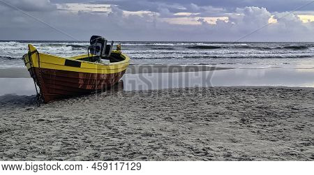 Sunset Over Baltic Sea With Fishing Boat On The Beach - Debki, Pomerania, Poland