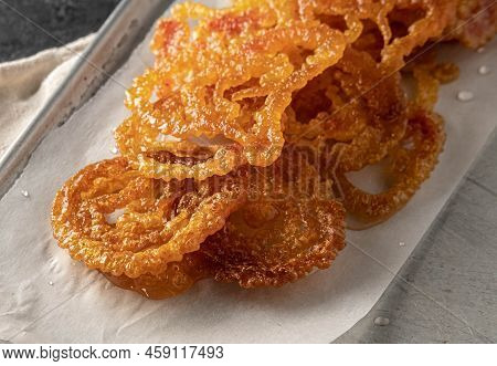 Jalebi Indian Sweets On A Metal Tray On A Dark Background.