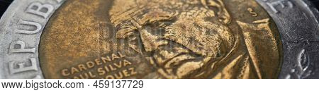 Translation: Republic Of Chile. Coin Of 500 Chilean Pesos Close-up. Peso Of Chile. News About Econom