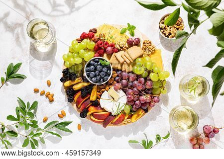 Autumn Cheese Board With Fresh Fruits And Berries Served With White Wine, Top View