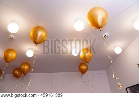 Golden Balloons On The Ceiling. Simple And Spectacular Decoration For The Party.