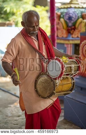 Man Using Dholak Drums In A Temple At Nellore, Andhra Pradesh, India, 01 Aug 2022