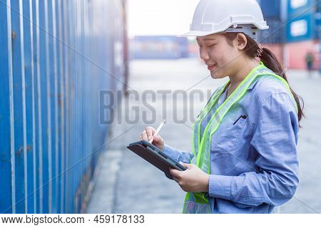 Woman Staff Worker Happy Working In Shipping Logistic Cargo Load Area Use Tablet Wireless Technology