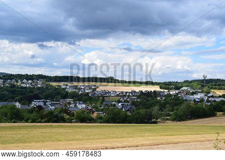 Dark Clouds Above A Small Town In Germany