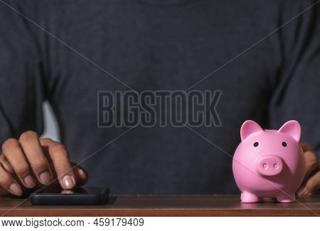 Save Money And Account Banking For Finance Concept, Piggy Bank With Coin On Blurred Background, Save