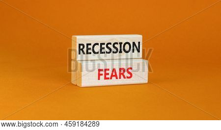 Recession Fears Symbol. Concept Words Recession Fears On Wooden Blocks On A Beautiful Orange Table O
