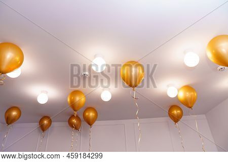 Golden Balloons On The Ceiling. Simple And Spectacular Decoration For The Party.