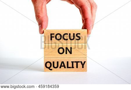 Focus On Quality Symbol. Concept Words Focus On Quality On Blocks On Beautiful White Table White Bac