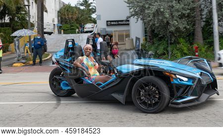 Miami Beach, Florida Usa - March 19, 2021: Blue Polaris Slingshot With Driver, Corner Side View.