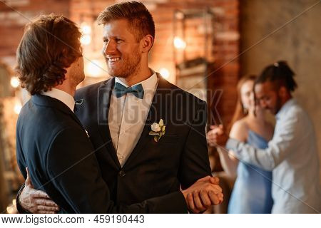 Portrait Of Happy Gay Couple Dancing Together During Wedding Ceremony, Copy Space