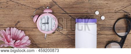 Women Health,middle Age And Menopause Concept. Health Care Style. Copy Space.white Plastic Bottle Wi