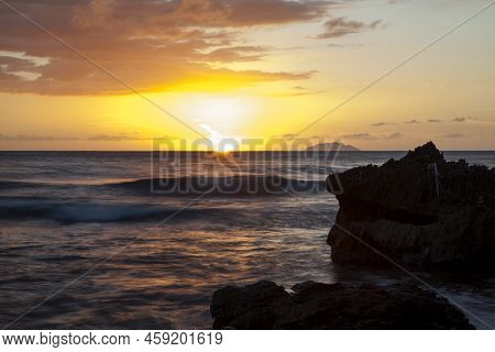 Sunset View Of The Water Along Ricon Beach In Puerto Rico.