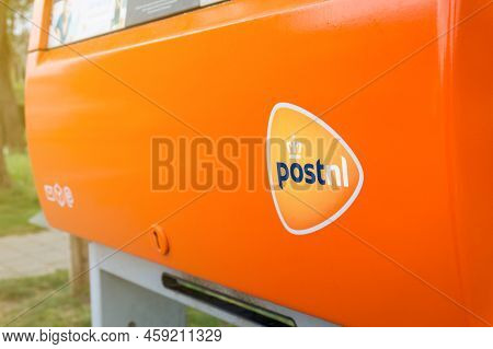 Postnl Orange Mail Box With Logo Close-up. Dutch Postal Service Company Mailbox. Hertogenbosch, The 