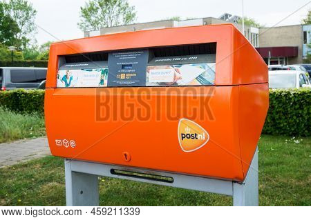 Postnl Orange Mail Box With Logo. Dutch Postal Service Company Letterbox. Hertogenbosch, The Netherl
