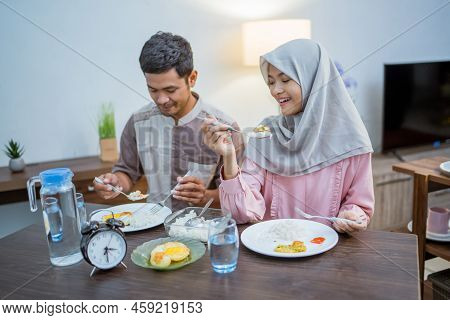 Muslim Couple Having Breakfast Or Sahur In The Morning