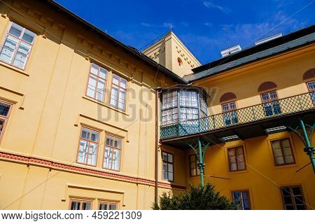 Slatinany, Czech Republic, 17 April 2022: Classical Chateau Or Romantic Yellow Castle Surrounded By 