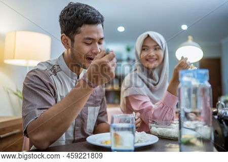 Muslim Couple Having Breakfast Or Sahur Early Morning