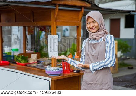 Proud Muslim Woman With Her Small Food Stall