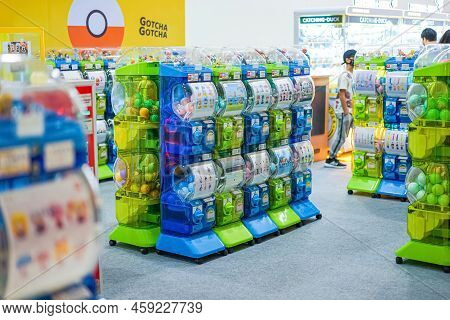 Bangkok, Thailand - 11 Feb 2022, There Are Light Green And Blue Gashapon Machines, A Variety Of Vend