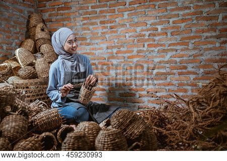 Craftswoman In Veil Smiling Weaving Crafts Woven Water Hyacinth