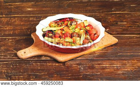 Grilled Mushrooms And Vegetables In Ceramic Bowl On Wooden Background.environmentally Friendly Menu 